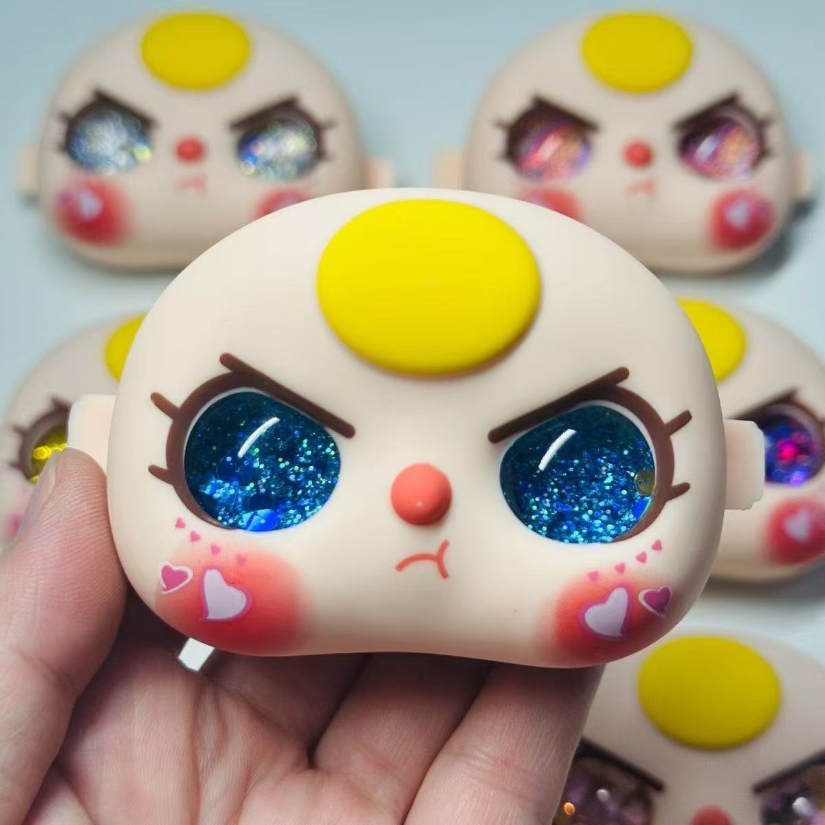 Baby Three 100 Face Toy Doll