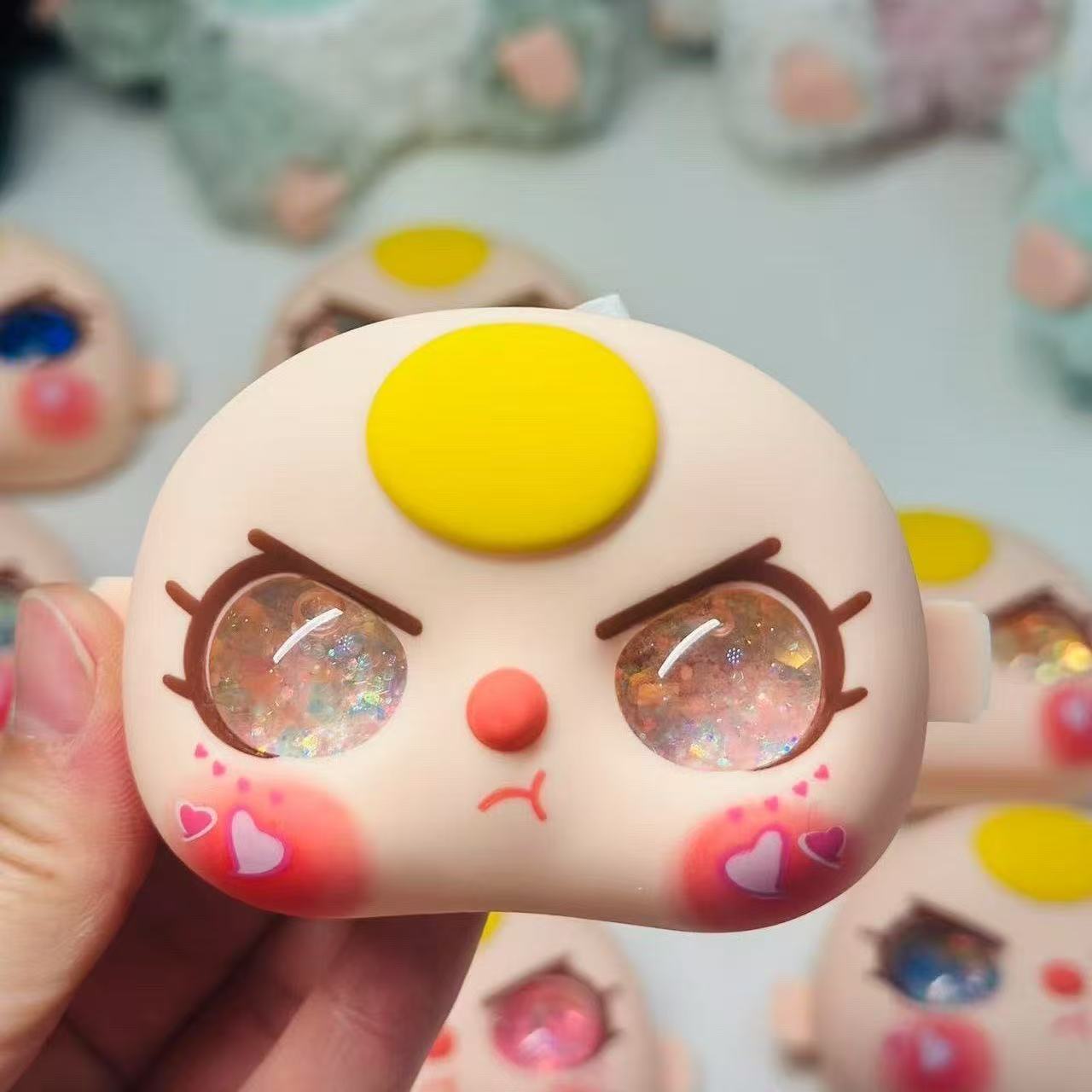 Baby Three 100 Face Toy Doll